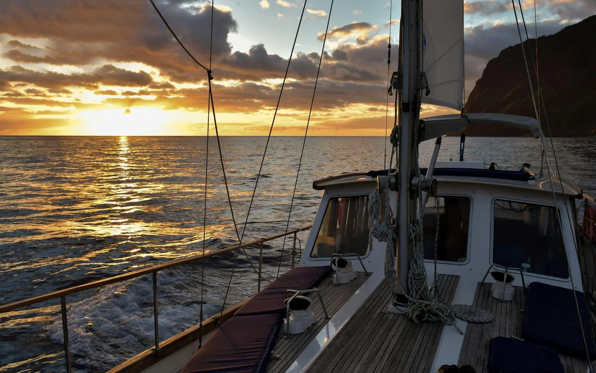 Sailing boat at sunset on Madeira Dolphin & Whale Watching tour.