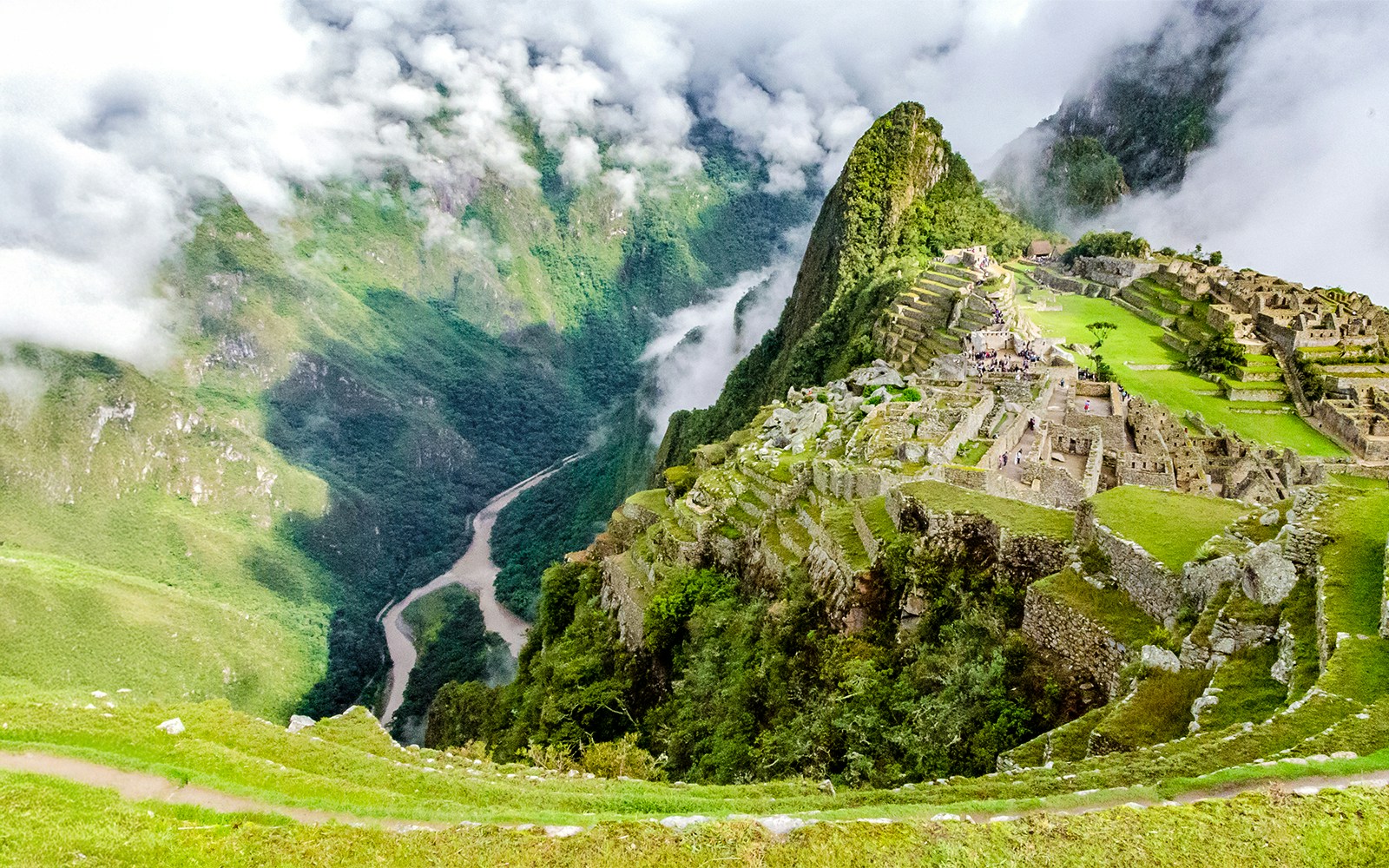 Panoramic view of Machu Picchu with Vilcanota River in the background.