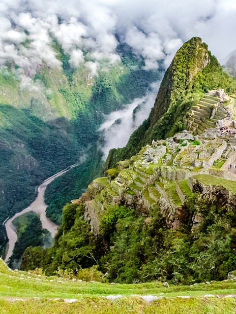 Panoramic view of Machu Picchu with Vilcanota River in the background.