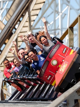 People enjoying a rollercoaster ride at Fun Spot America, Orlando.