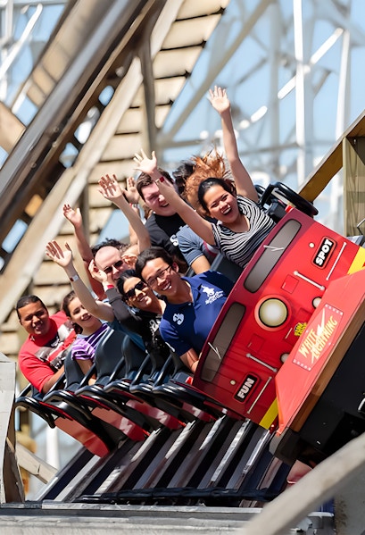 People enjoying a rollercoaster ride at Fun Spot America, Orlando.