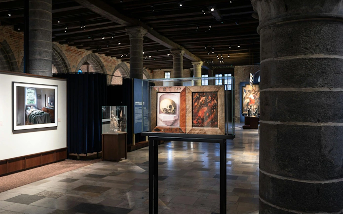 Exhibit of artwork and sculptures inside Museum Sint-Janshospitaal, Bruges.