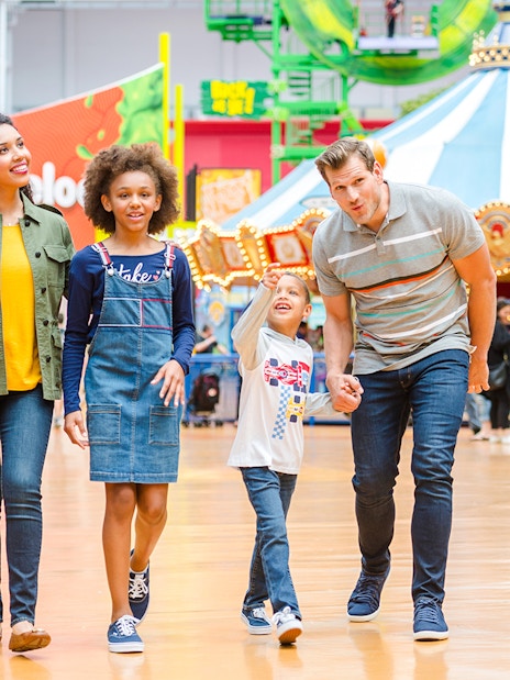 Family enjoying Nickelodeon Universe at Mall of America.