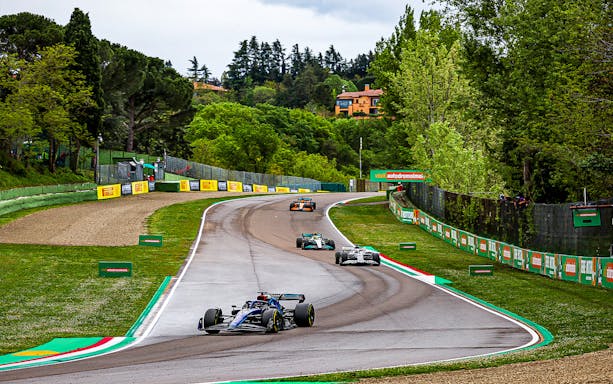 Race cars on track at Imola for Formula 1 Gran Premio del Made in Italy e dell'Emilia-Romagna.