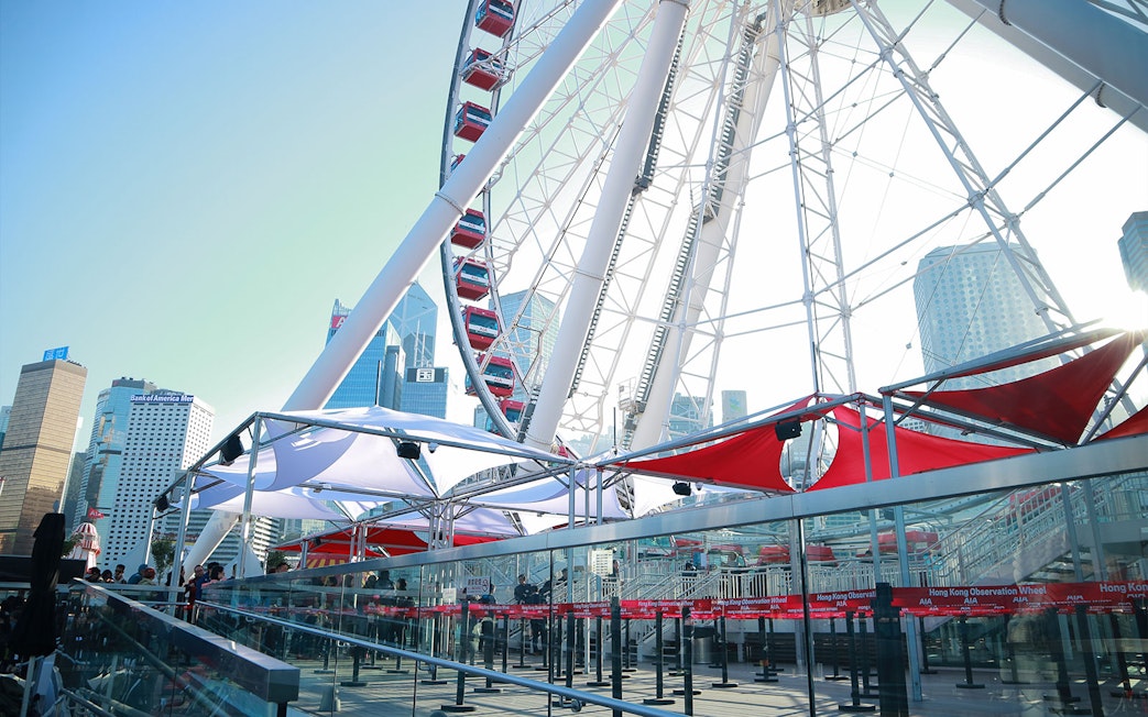 Hong Kong Observation Wheel with city skyline in the background.
