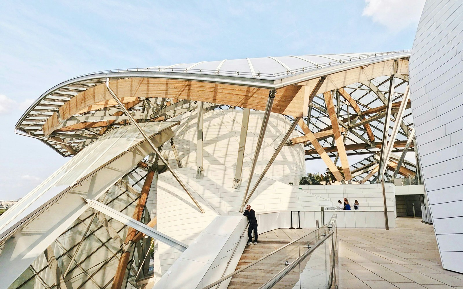 Louis Vuitton Foundation's modern architecture with glass and wooden structures in Paris.