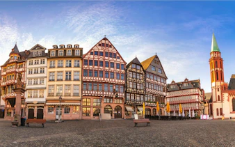 Half-timbered buildings in Old Town Frankfurt during a self-guided city exploration game.