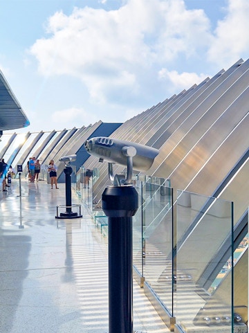 Observation deck with telescopes overlooking Palm Jumeirah, Dubai.