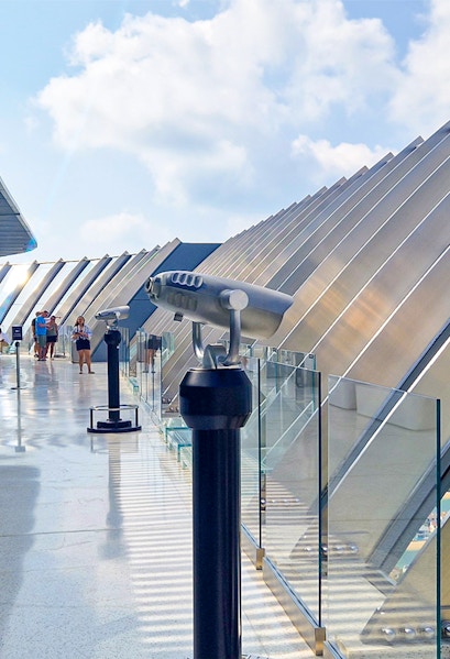 Observation deck with telescopes overlooking Palm Jumeirah, Dubai.