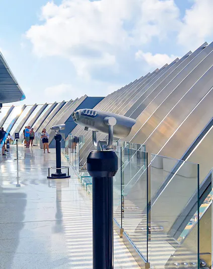 Observation deck with telescopes overlooking Palm Jumeirah, Dubai.