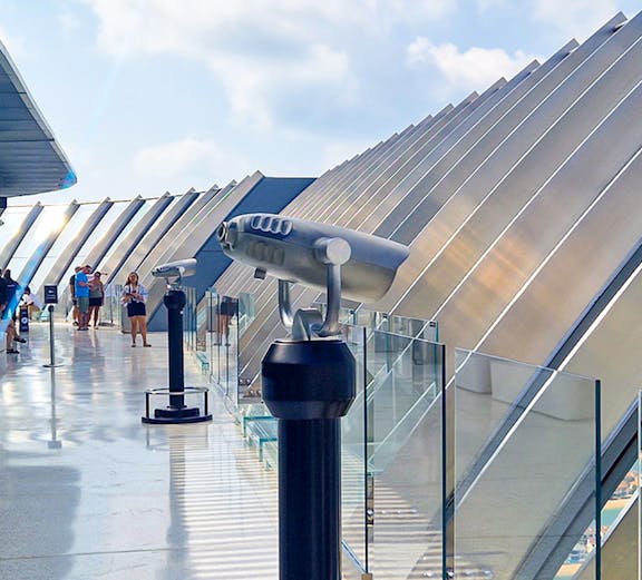 Observation deck with telescopes overlooking Palm Jumeirah, Dubai.