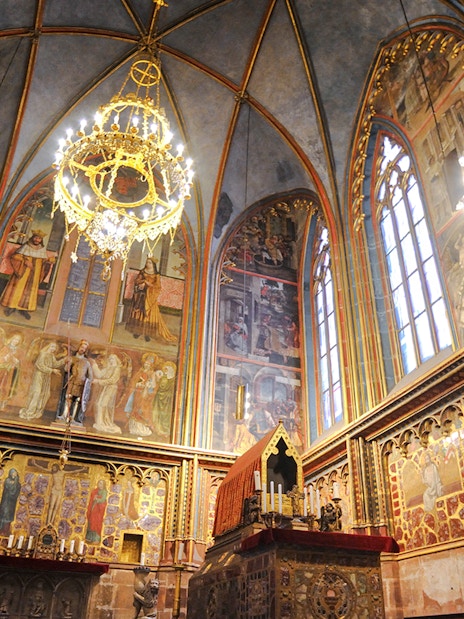 St Wenceslas Chapel interior with ornate frescoes and chandelier, Saint Vitus Cathedral, Prague.