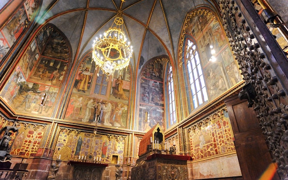 St Wenceslas Chapel interior with ornate frescoes and chandelier, Saint Vitus Cathedral, Prague.