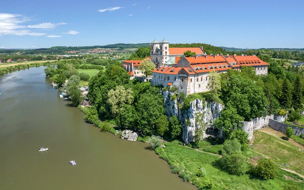 Tyniec Abbey overlooking the Vistula River near Krakow, Poland, seen from a sightseeing cruise.