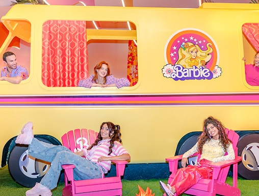 Children enjoying rides at Dubai theme park, featuring roller coasters and interactive attractions.