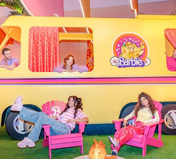 Children enjoying rides at Dubai theme park, featuring roller coasters and interactive attractions.