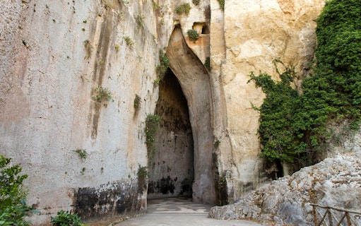 Entrance to the Ear of Dionysius cave at Neapolis Archaeological Park, Syracuse.