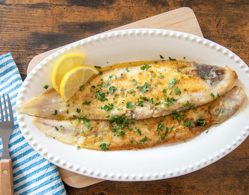 Trout dish with lemon slices served at Medieval Dinner in Prague.