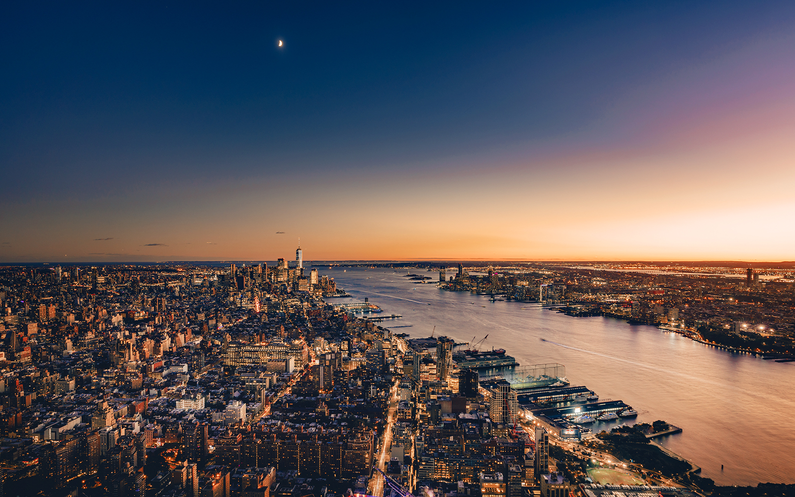 New York City skyline at sunset from Edge Observation Deck, overlooking the Hudson River.