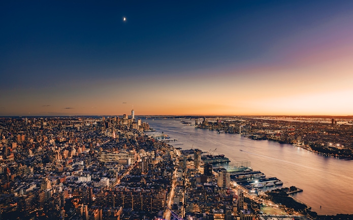New York City skyline at sunset from Edge Observation Deck, overlooking the Hudson River.