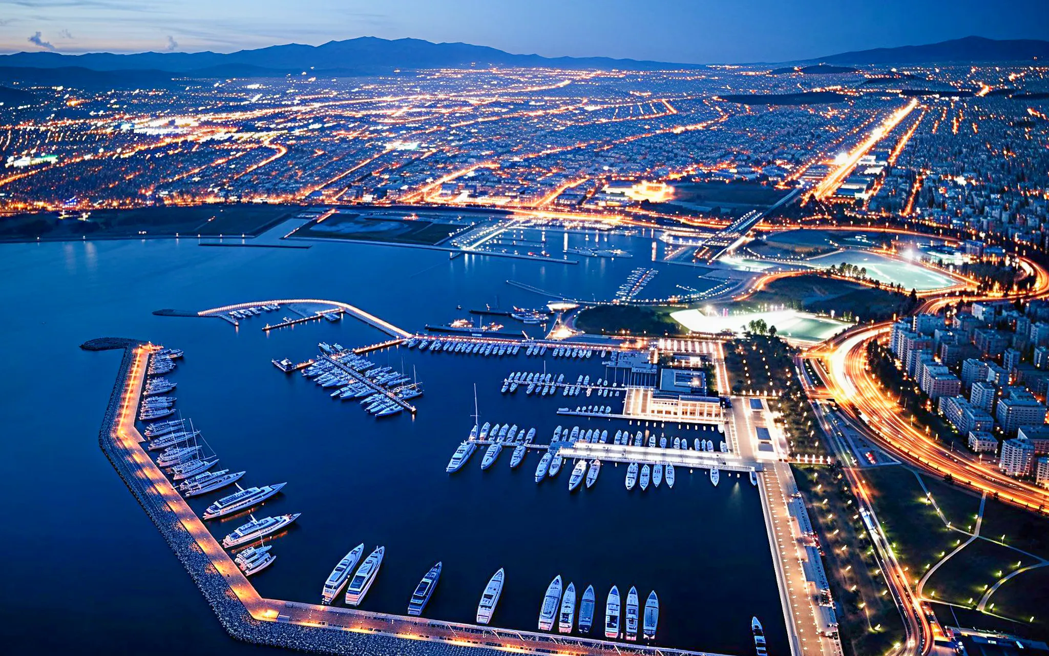 Aerial view of Athens marina at night, part of Sounion Half-Day Tour.
