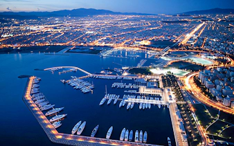 Aerial view of Athens marina at night, part of Sounion Half-Day Tour.