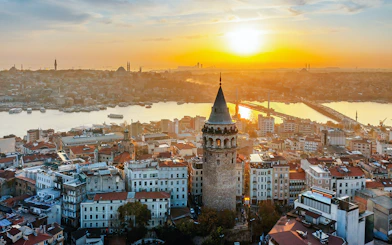 Aerial view of Galata Tower at sunset in Istanbul, Turkey.