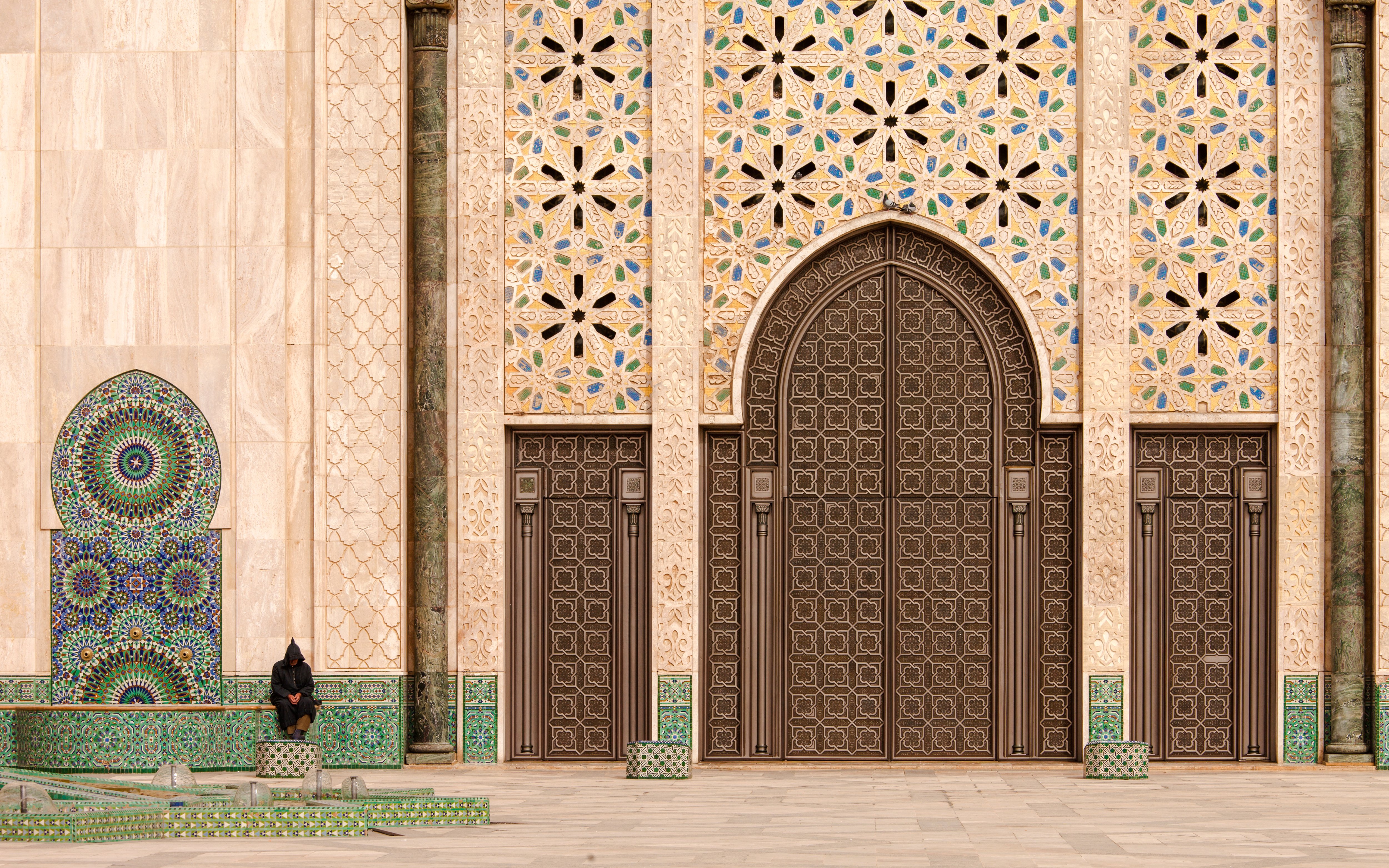 Hassan II Mosque ornate entrance with intricate tilework, Casablanca, Morocco.