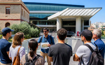 Tour group with guide outside Acropolis Museum, Athens.