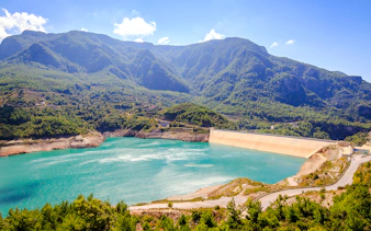 Oymapınar Dam with turquoise reservoir and surrounding mountains in Alanya, Turkey.