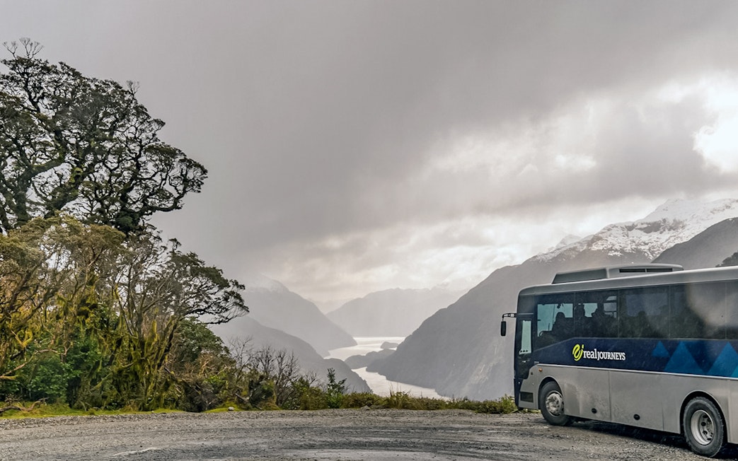 Cruise ship deck view of Doubtful Sound fjord, Te Anau overnight tour.