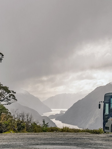 Cruise ship deck view of Doubtful Sound fjord, Te Anau overnight tour.