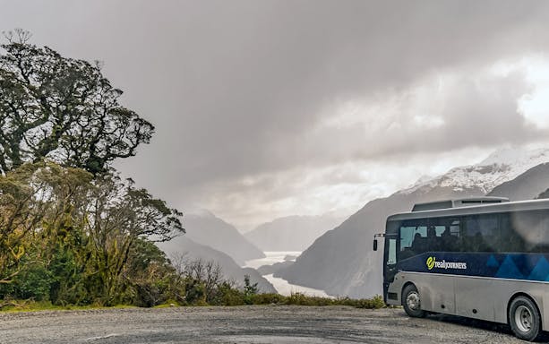 Cruise ship deck view of Doubtful Sound fjord, Te Anau overnight tour.