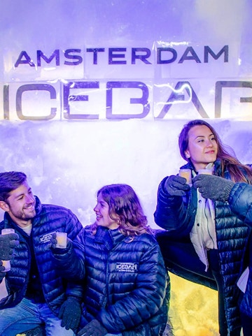 Visitors enjoying drinks at the Xtracold Icebar in Amsterdam.