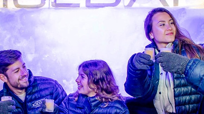 Visitors enjoying drinks at the Xtracold Icebar in Amsterdam.