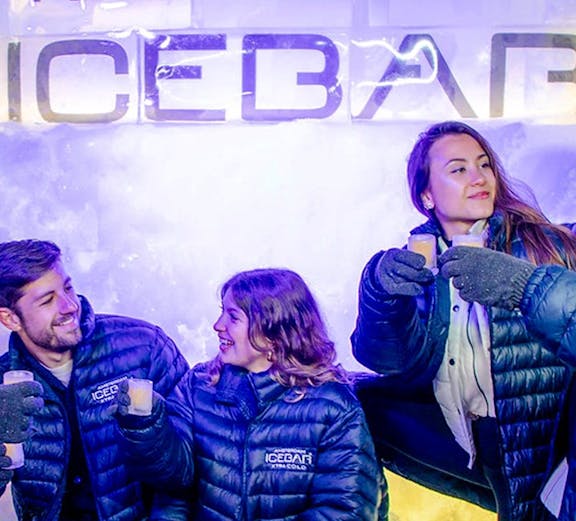 Visitors enjoying drinks at the Xtracold Icebar in Amsterdam.