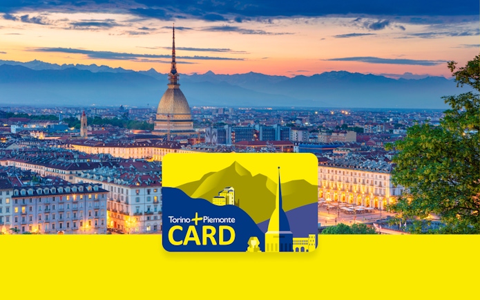 Torino skyline at sunset with Mole Antonelliana and Torino + Piemonte Card.