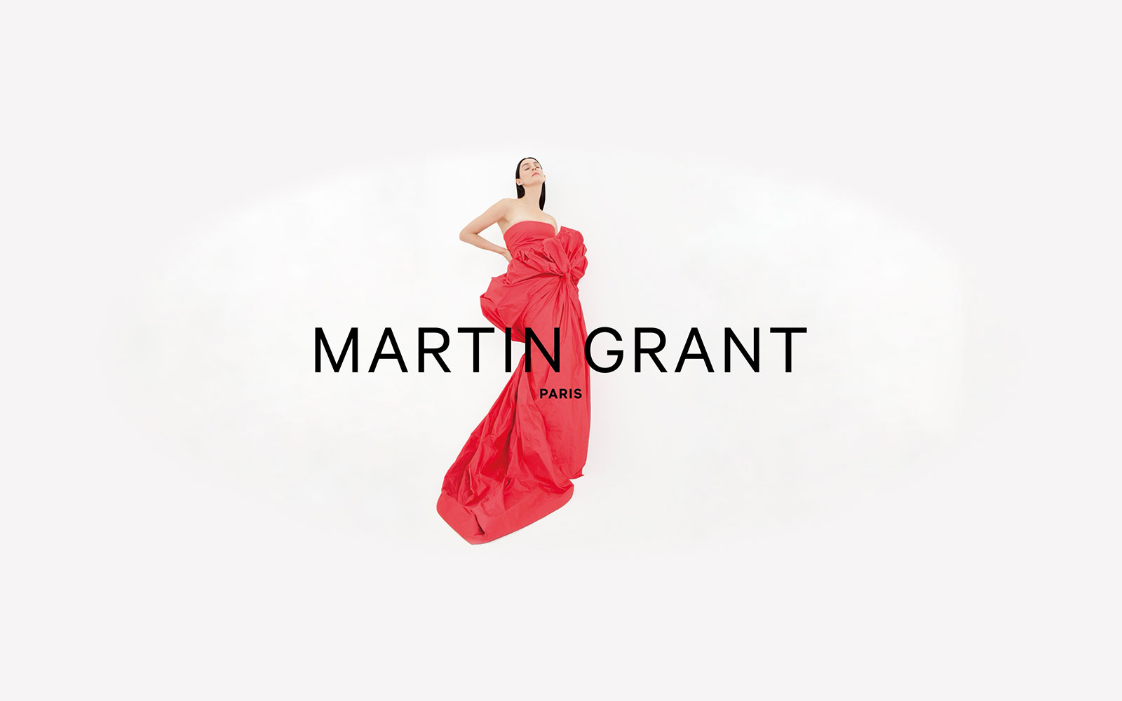 Model in red gown by Martin Grant Paris.
