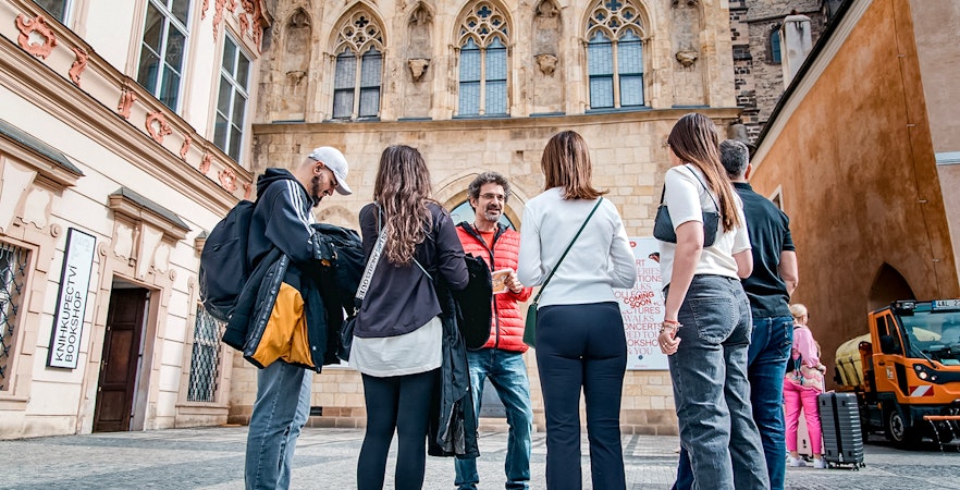 A tour guide giving info to tourist