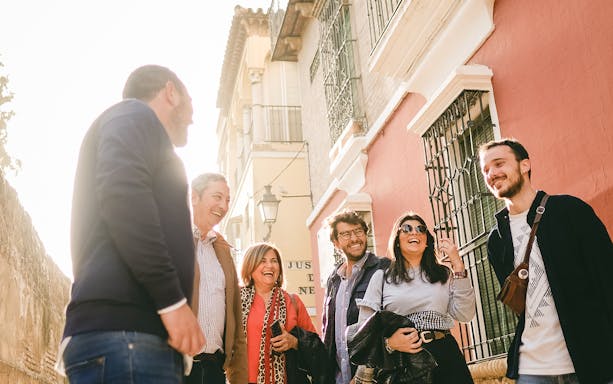 Group enjoying a guided walk in the Jewish Quarter, exploring historic architecture.