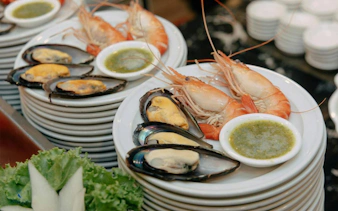 Seafood platter with prawns and mussels on Unicorn Dinner Cruise, Bangkok.