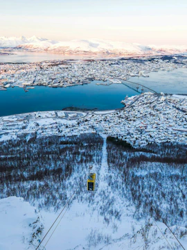 Panoramic winter view of Tromsø from Fjellheisen cable car station, Norway.