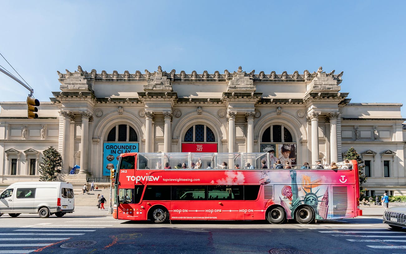 Hop On Hop Off bus in front of The Met, New York City.