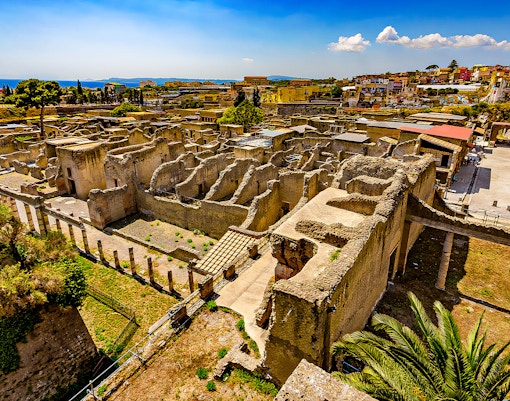 Herculaneum Ruins with ancient stone structures and columns in Italy.