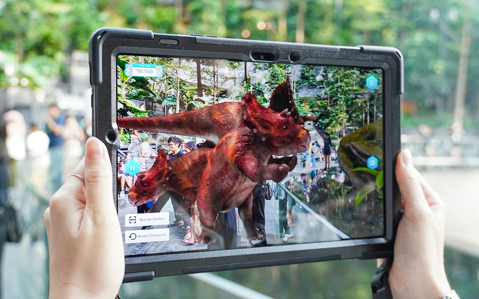 A customer at Jewel-rassic Quest, the AR experience