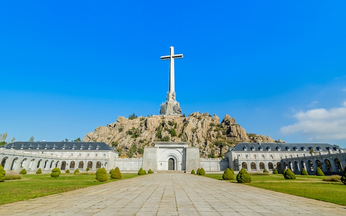 Valle de los Caídos monument with large cross in Spain.