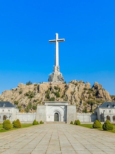 Valle de los Caídos monument with large cross in Spain.