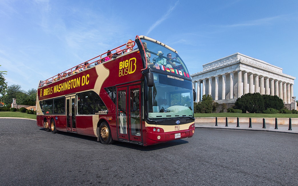 Big Bus tour in Washington DC passing the Lincoln Memorial.