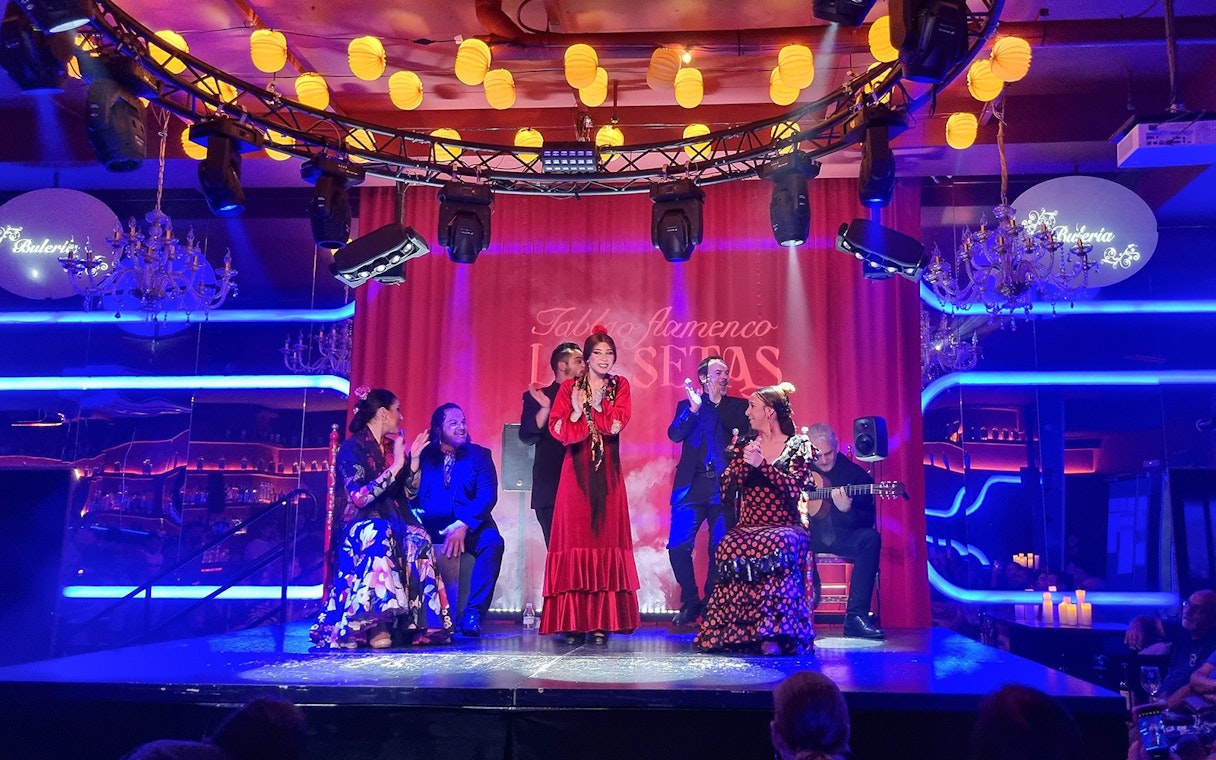 Flamenco dancers performing at Las Setas in Seville, Spain.