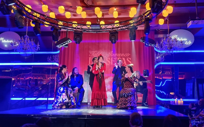 Flamenco dancers performing at Las Setas in Seville, Spain.
